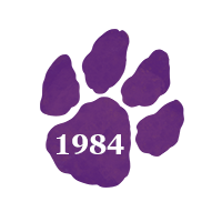 Purple paw print with text "1984"